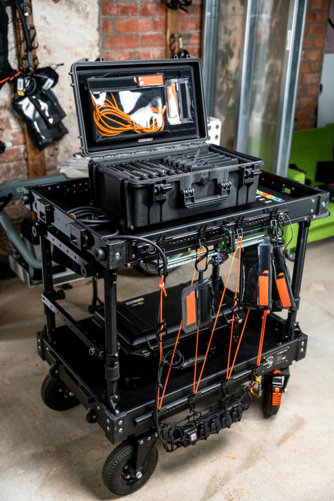 Close-up of a versatile film production cart with organized gear, ideal for on-set use.